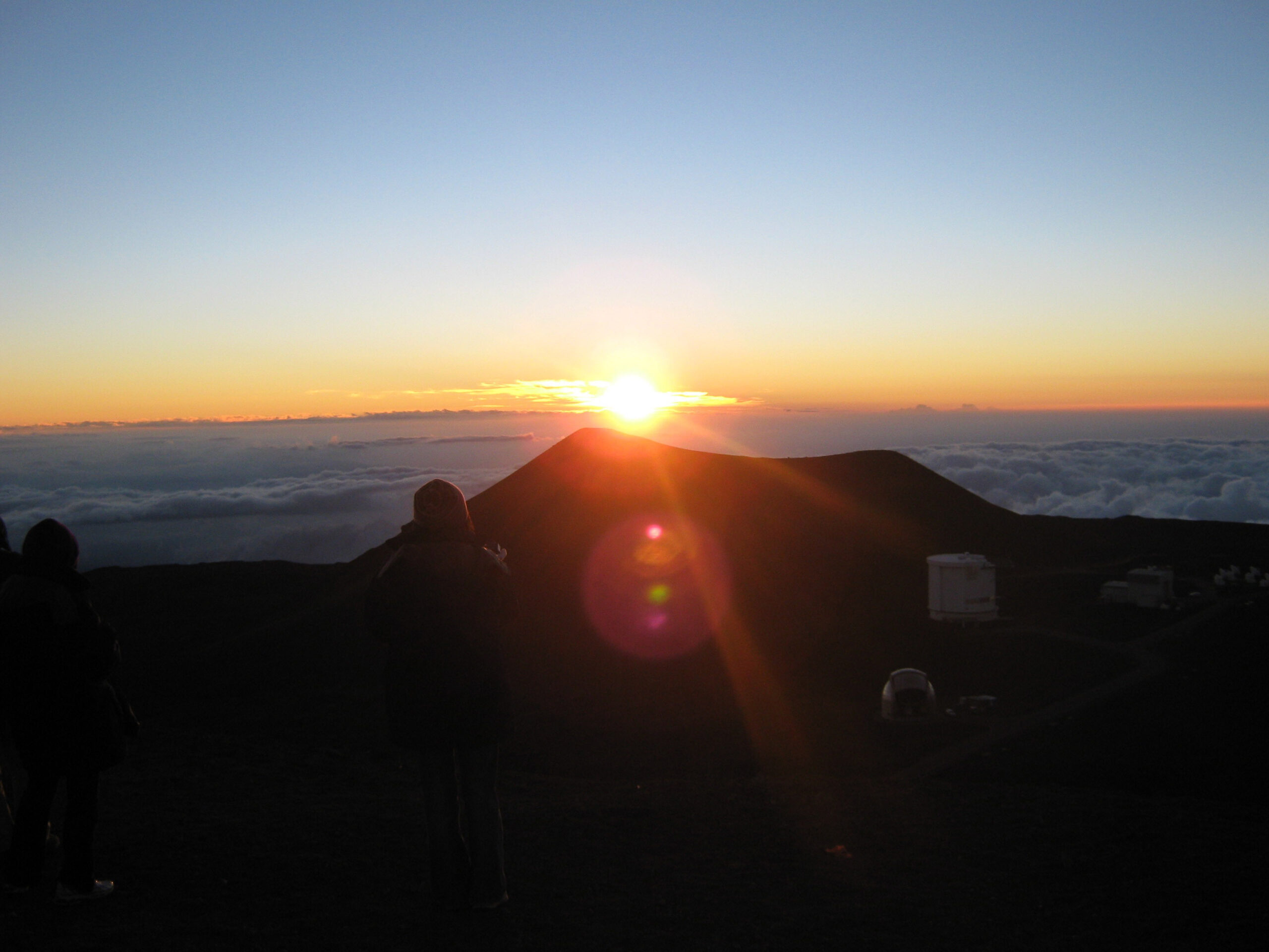 A picture of a sunset on top of Mauna Kea